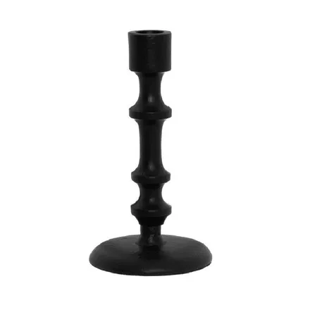 Antiikküünlahoidja Fanni K Tuli must