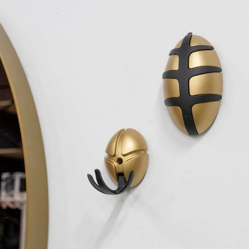Spinder Design seinanagi Tick kuldne/must